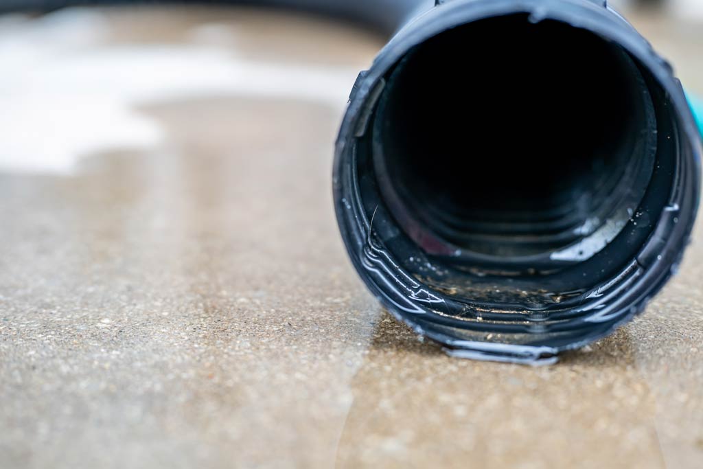 A hose for draining water from a flooded basement