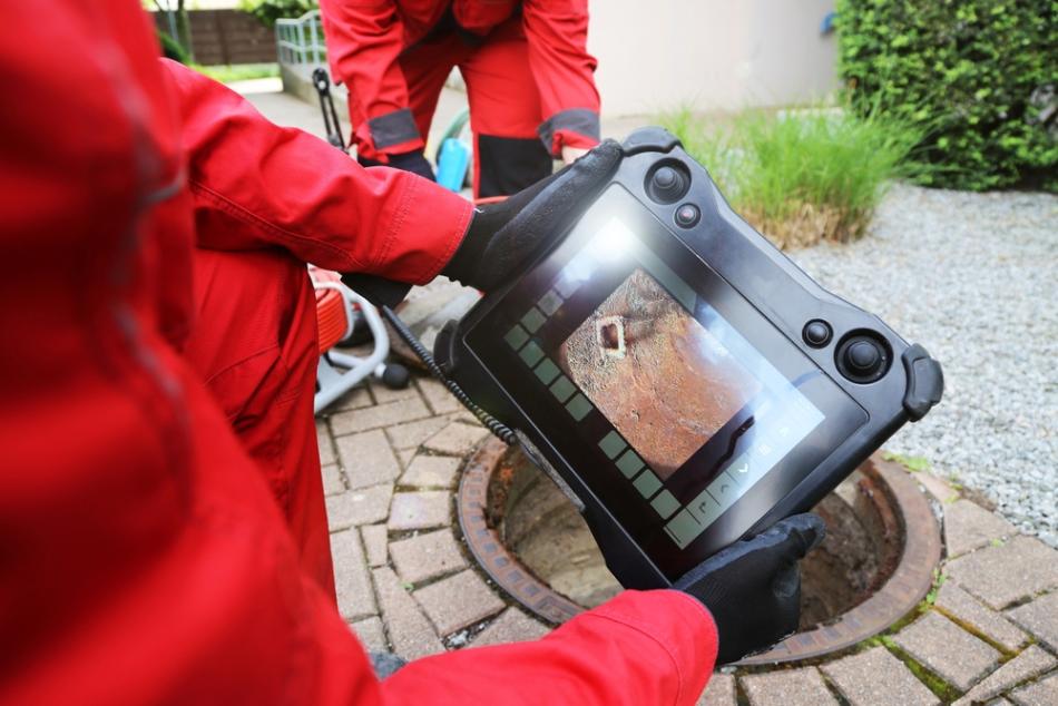 A monitor viewing the inside of a sewer