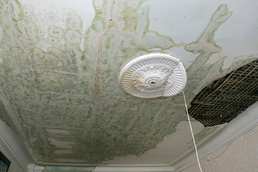 Damaged ceiling from a broken pipe 